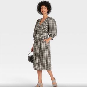 Small black and cream plaid wrap style dress